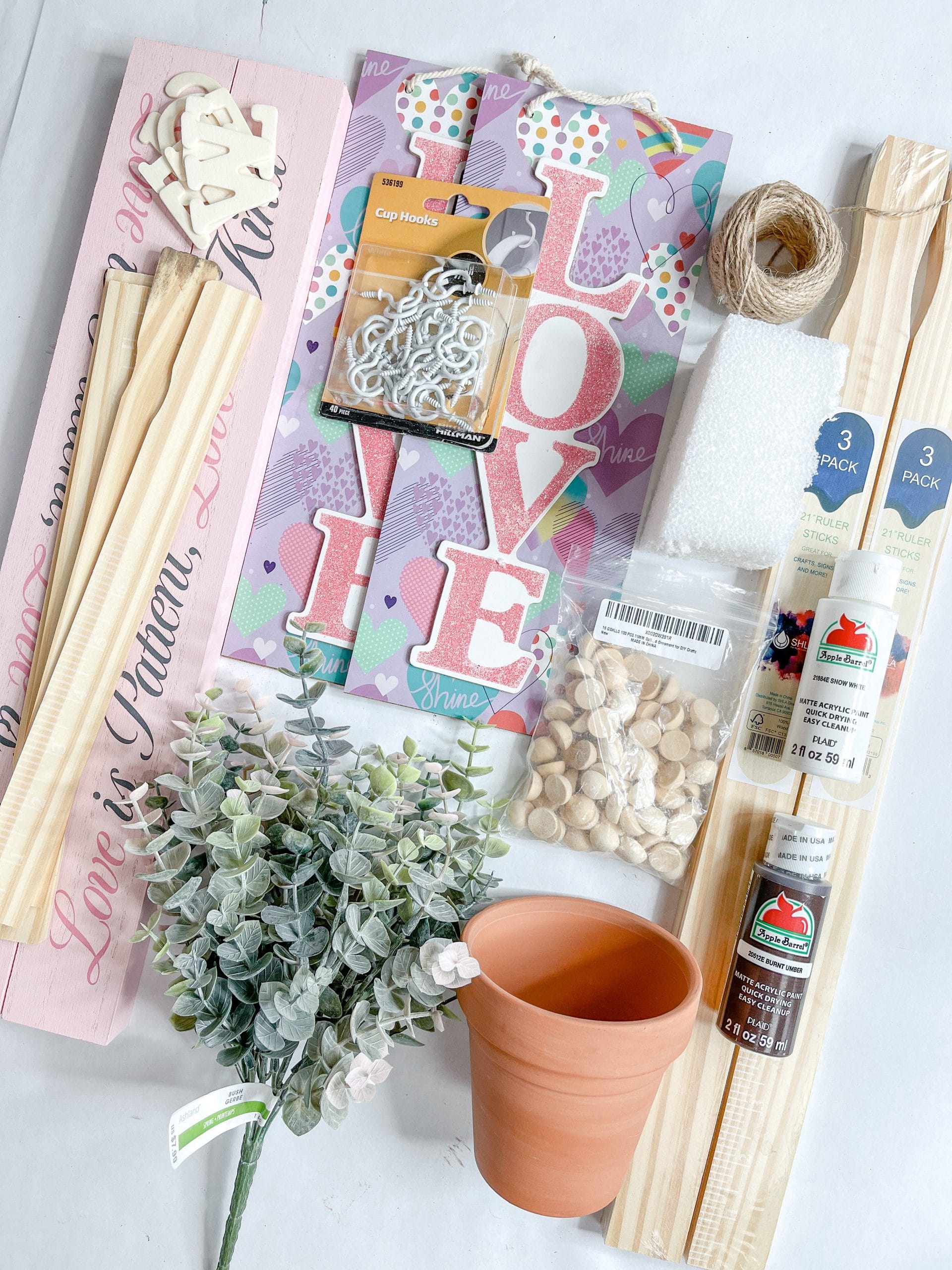 DIY Front Porch Hanging Flower Basket Stand using items from Dollar Tree