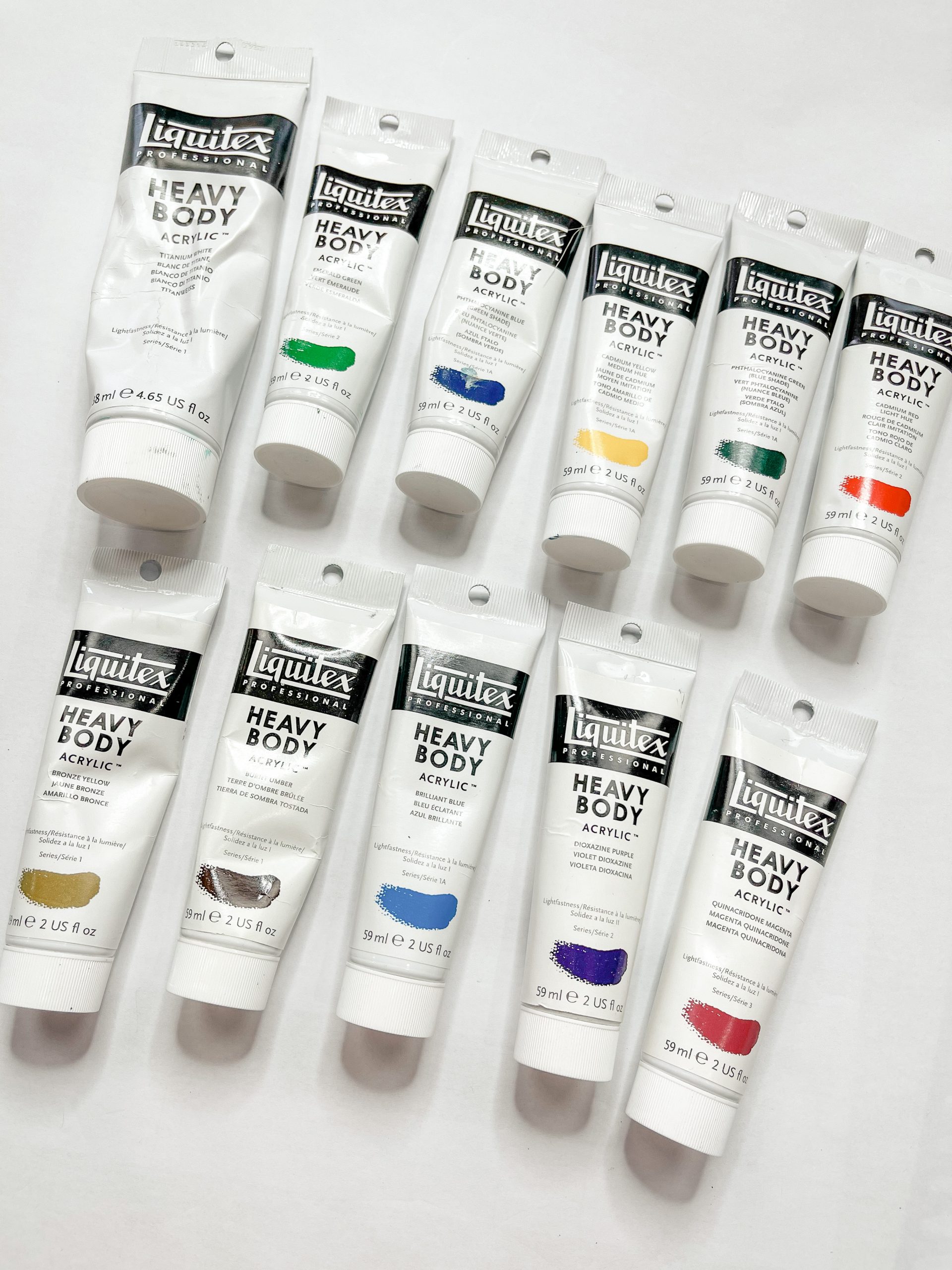 Liquitex heavy body acrylic paints to create art on Dollar Tree Canvas