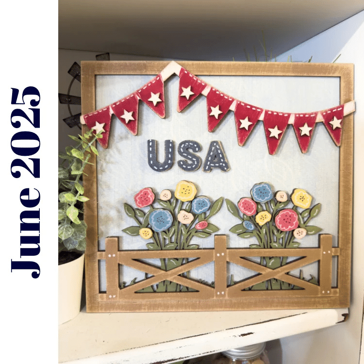 classic patriotic farhouse sign with red banner, USA, brown fence and two flower bouquets