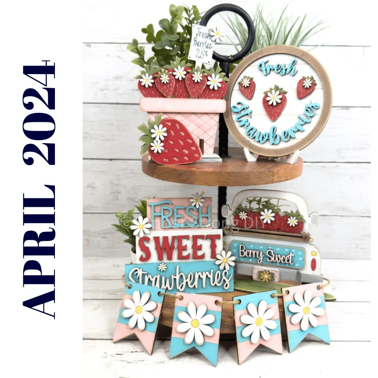 Strawberry themed teired tray set painted and displayed in a pink, red, white, and teal color pallete