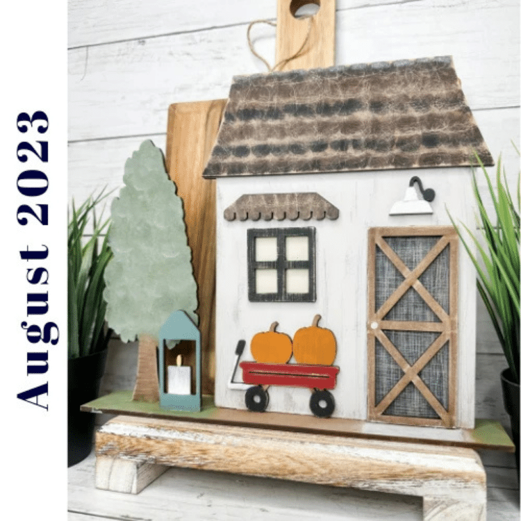 cottage style house shelf sitter with tree and pumpkins in a wago painted and assembled with farmhouse style