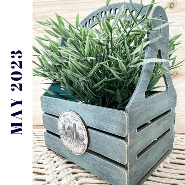 wooden 3 dimensional farmhouse crate with greenery inside