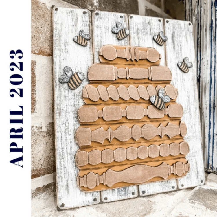 spindle bee hive craft kit painted and assembled in April 2023