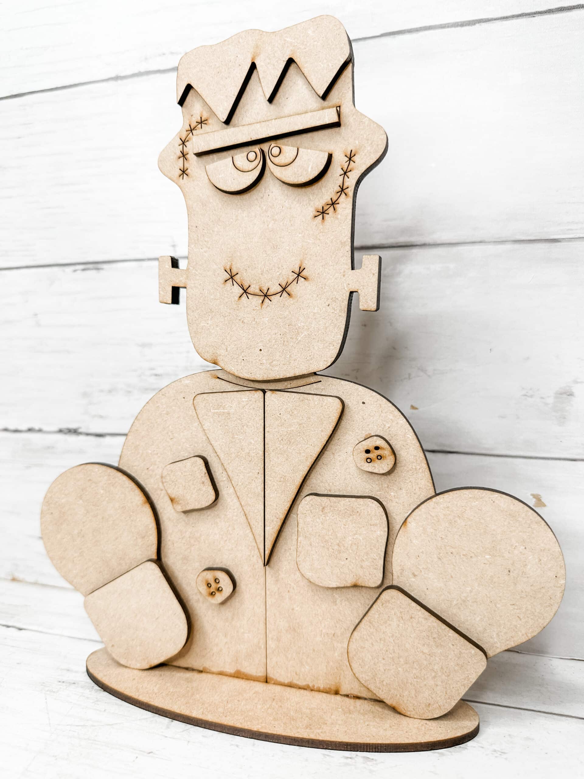 assembled unpainted frankenstein diy craft kit displayed on a neutral background
